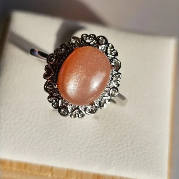 DR-TDS-09-01 Mondstein Ring Orangefarbton, Blumenhalterung, Versilbert