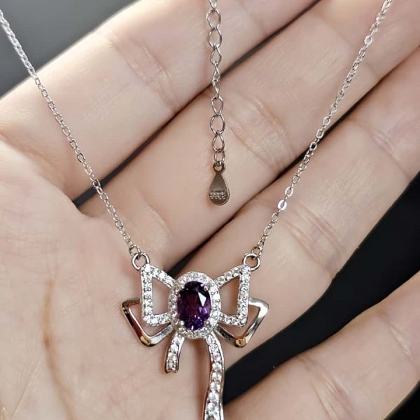 Silberanhänger Schmetterlingsknoten Amethyst mit Zirkonia in 925er Silber