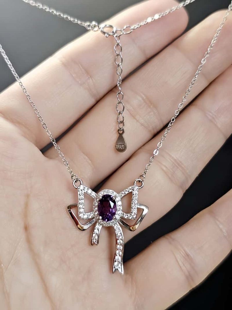 Silberanhänger Schmetterlingsknoten Amethyst mit Zirkonia in 925er Silber