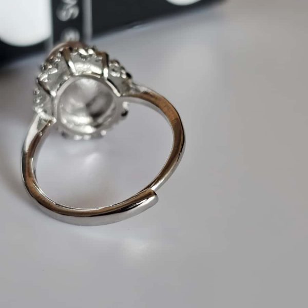 versilberter Ring mit orangefarbenem Mondstein Blumen