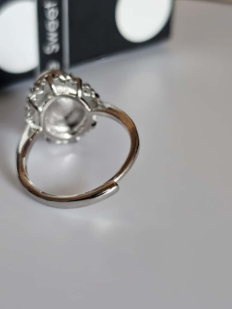 versilberter Ring mit orangefarbenem Mondstein Blumen