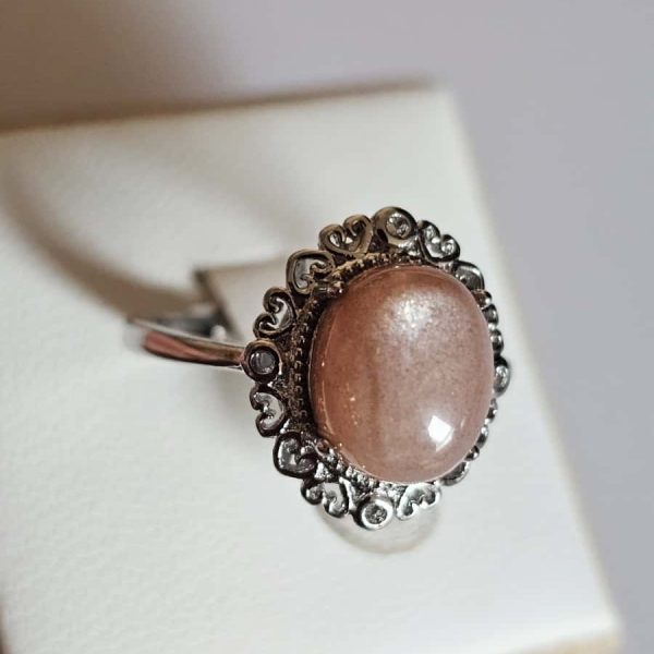 versilberter Ring mit orangefarbenem Mondstein Blumen