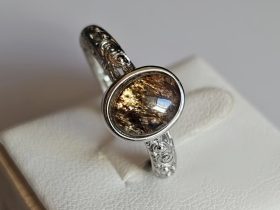 Ringe-DR0011-04 Damenring mit Schwarzgoldene Super Seven Edelstein