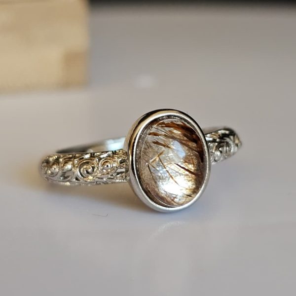 Damenring mit Schwarzgoldene Super Seven Edelstein