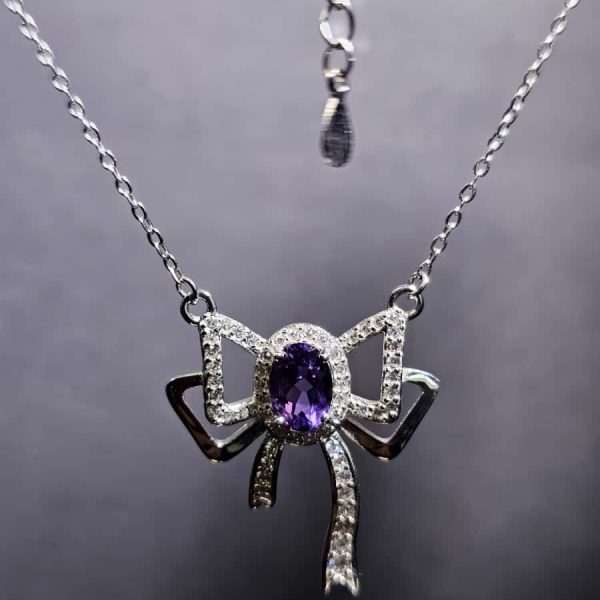 Silberanhänger Schmetterlingsknoten Amethyst mit Zirkonia in 925er Silber