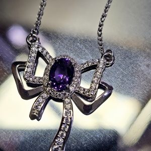 Silberanhänger Schmetterlingsknoten Amethyst mit Zirkonia in 925er Silber