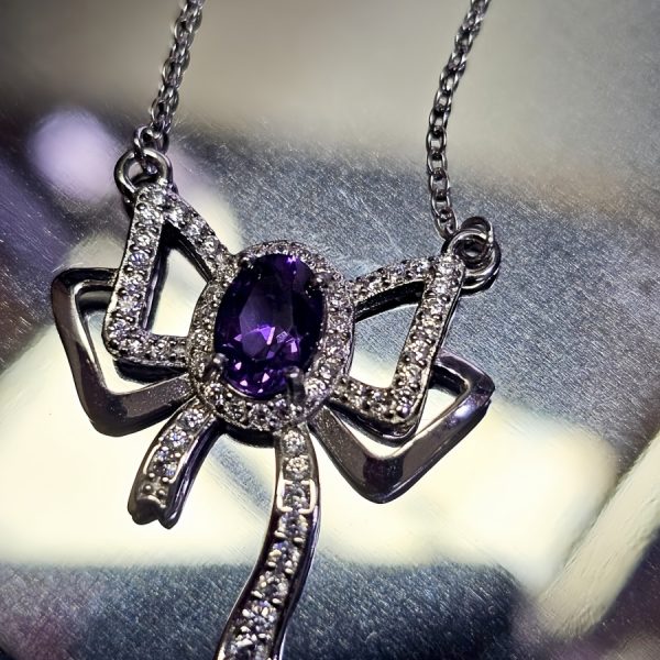 Silberanhänger Schmetterlingsknoten Amethyst mit Zirkonia in 925er Silber