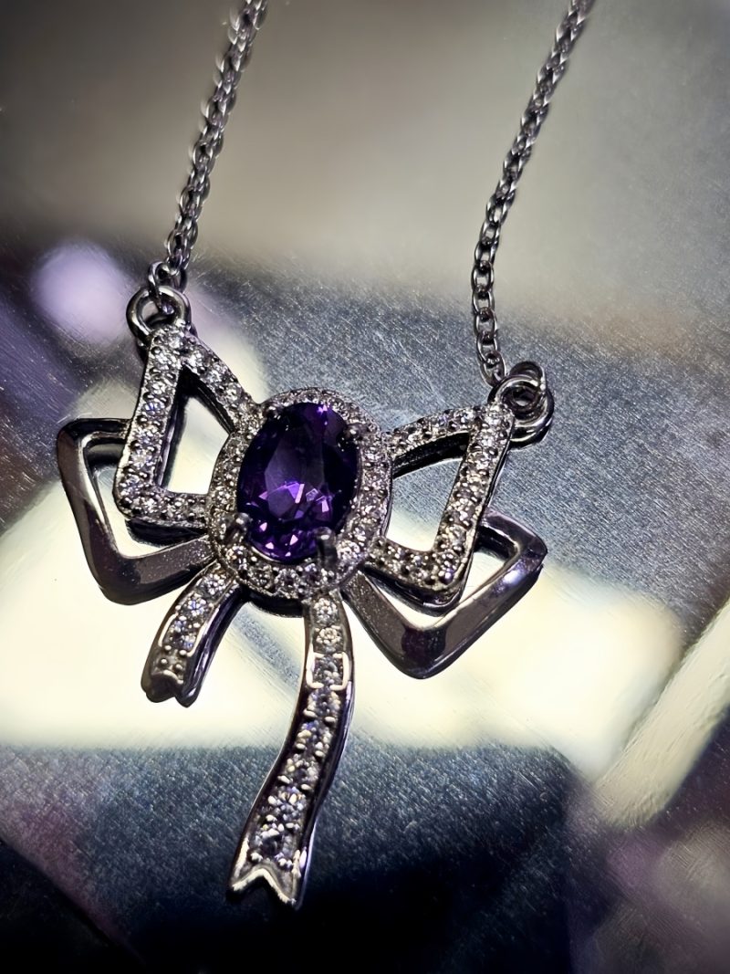 Silberanhänger Schmetterlingsknoten Amethyst mit Zirkonia in 925er Silber