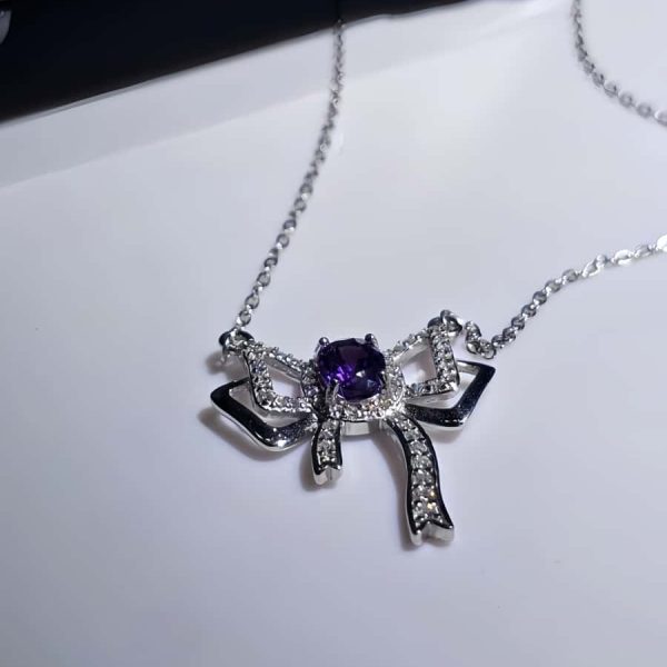 Silberanhänger Schmetterlingsknoten Amethyst mit Zirkonia in 925er Silber