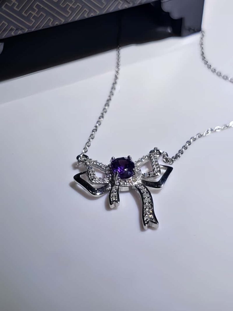 Silberanhänger Schmetterlingsknoten Amethyst mit Zirkonia in 925er Silber