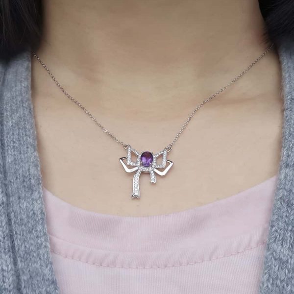Silberanhänger Schmetterlingsknoten Amethyst mit Zirkonia in 925er Silber
