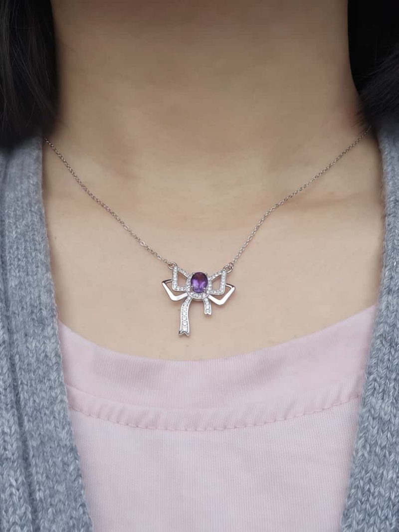 Silberanhänger Schmetterlingsknoten Amethyst mit Zirkonia in 925er Silber