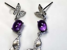 Silber-Ohrringe mit Zirkonia und natürlichem Amethyst Elegant hängende Ohrringe aus Silber mit Zirkonia-Besatz und natürlichen Amethysten