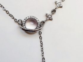 Damen Halskette Stern Mond silberfarben mit Zirkonia und Rosenquarz