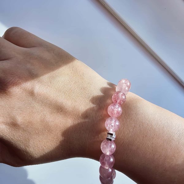 Armband aus sart-rosafarbenen Quarzstein Kugeln und Maigloeckchen versilbert