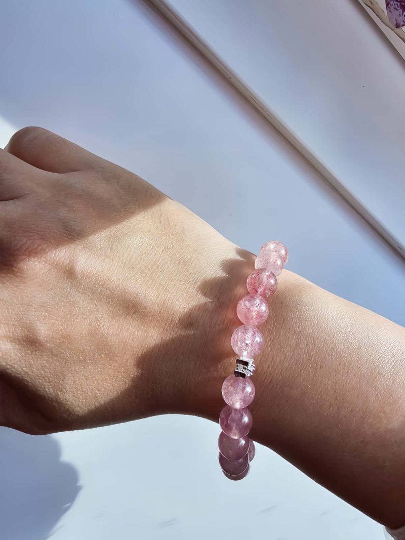 Armband aus sart-rosafarbenen Quarzstein Kugeln und Maigloeckchen versilbert