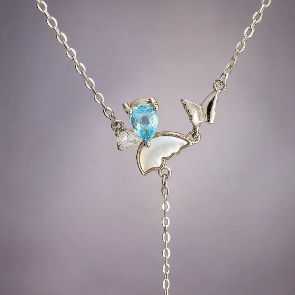 S925 Silber Y-Halskette mit natürlichem blauem Topas und Zirkonia vor einem grauer Hintergrund, Kette 40+5 cm